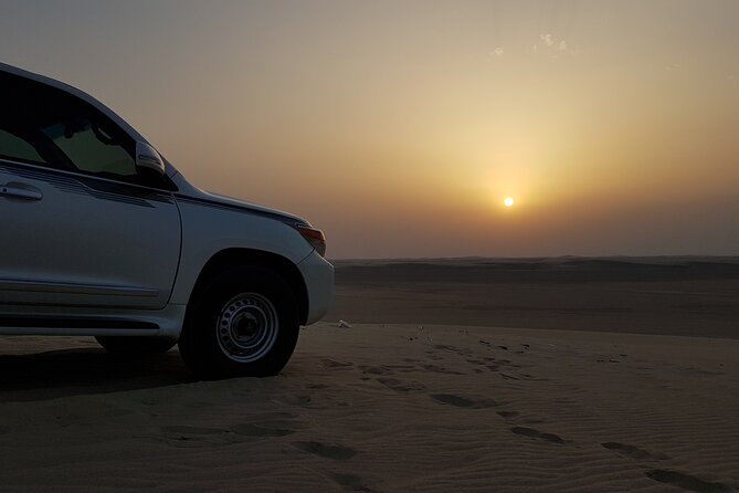 Doha: Sunrise /Sunset Desert Safari with Sand Boarding,Camel ride - What the guide can and cannot add