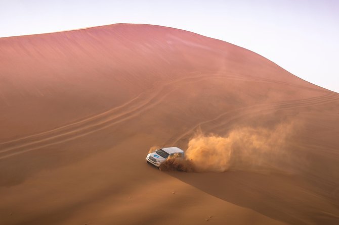 Doha: Sunset Desert Safari, Camels, Sandboarding & Inland Sea - Pickup at the National Museum and the Ride South