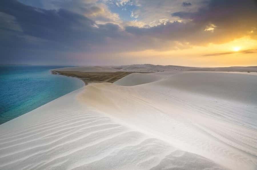 Doha: Sunset Desert Safari with Camel Ride & Sandboarding - Sunset photo stops and the Inland Sea