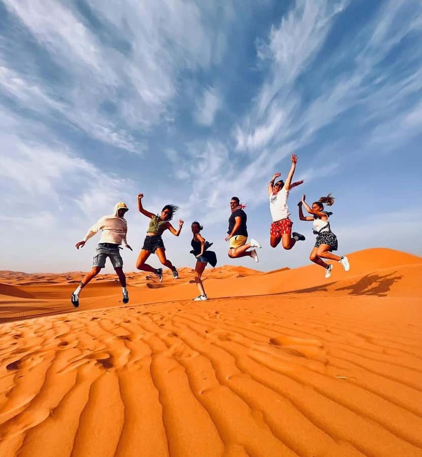 Doha: Sunset Desert Safari with Camel Ride & Sandboarding - What the $20 price really offers