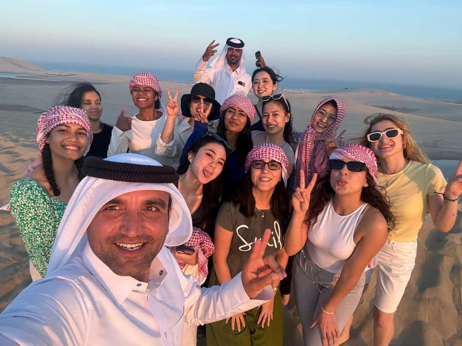 Doha: Sunset Safari, Dune Bashing, Sandboarding & Camel Ride - A short camel ride at the local camp