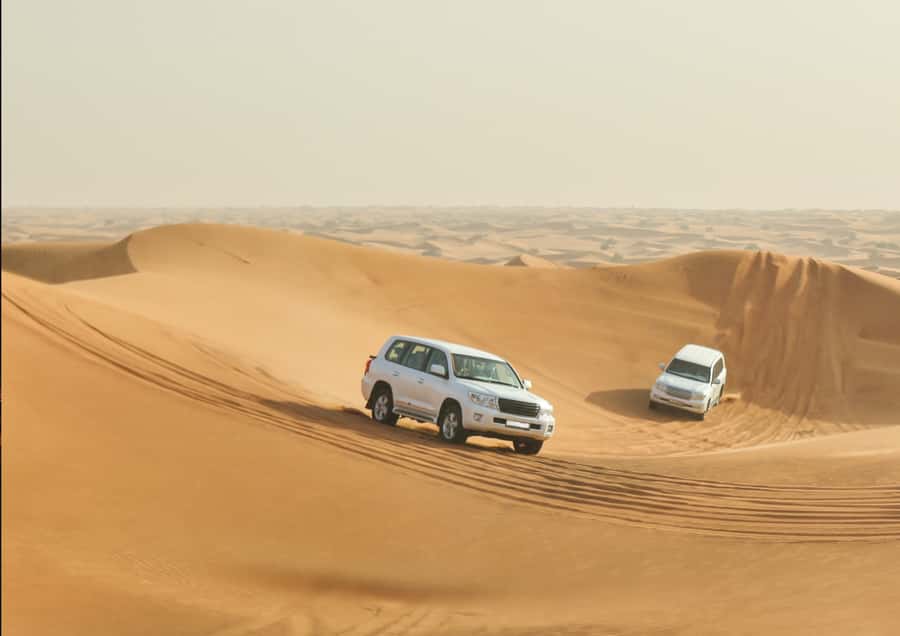 Doha: Sunset Safari, Dune Bashing, Sandboarding & Camel Ride - Sandboarding without an extra charge