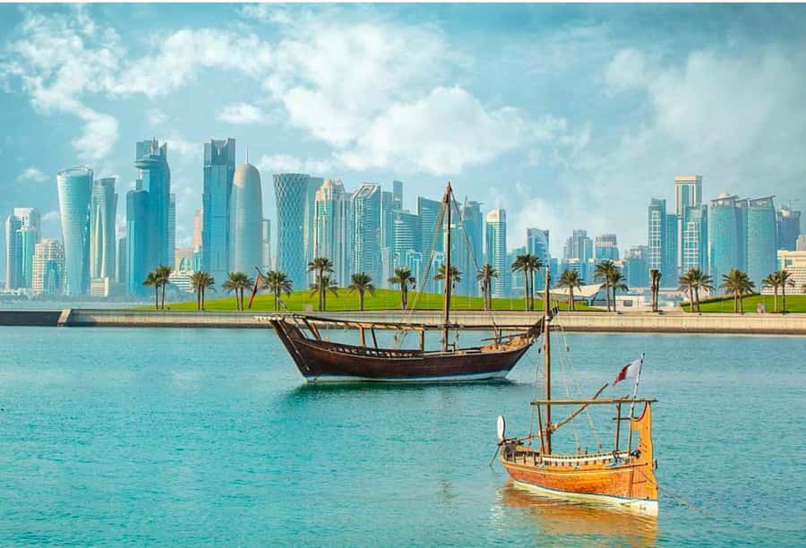 Doha: Sunset Serenade Skyline Dhow Cruise with Buffet Dinner - Boarding a traditional dhow in Doha Bay