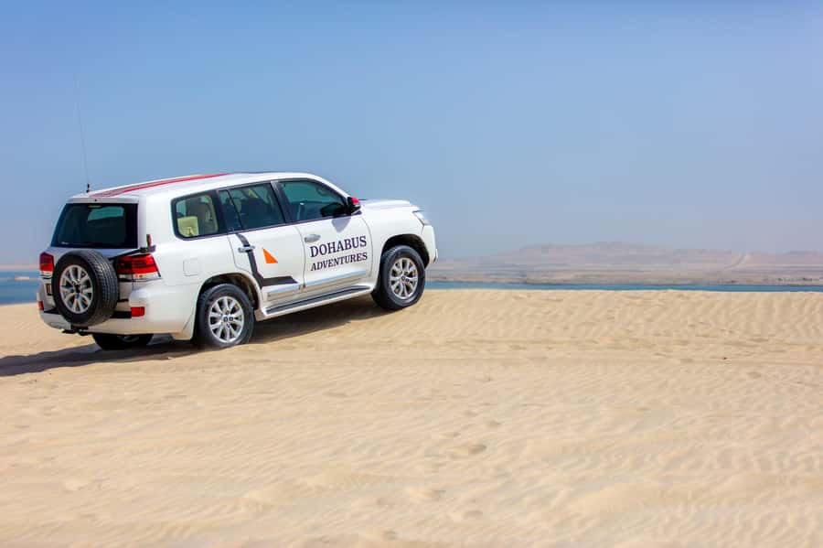 From Doha: 8-hour Safari Tour with Desert Beach Experience - Dune bashing before the Inland Sea photo stop
