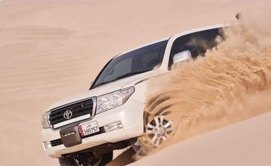 From Doha: Inland Sea Desert Safari with All Activities - A Rest at the Bedouin-Style Camp