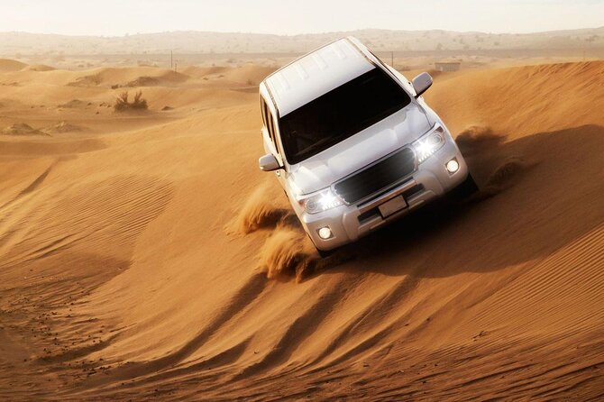 Full-Day DesertSafari with Camel Ride,InlandSea & BBQ Desert Camp - Sealine Beach begins the adventure
