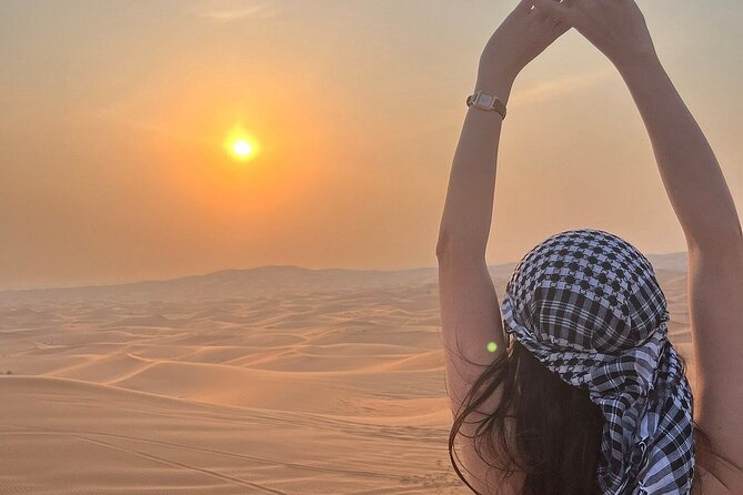Fullday City Tour and Desert Safari with Camel Ride and SandBoard - Dune bashing and sandboarding