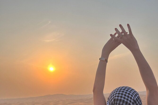 Half Day Desert Safari with Sand Boarding and Camel Ride - A 4X4 ride across the dunes
