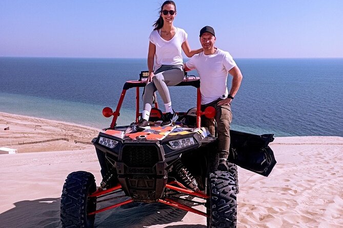 Half Day Private Desert Safari in Doha - Sandboarding, camel rides, and the inland sea