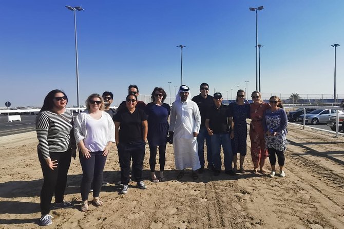 Half-Day Private Guided Camel Race Tour in Qatar - Meeting the camels and taking photographs