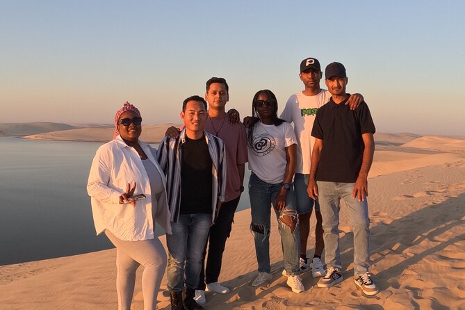 Half Day Safari Tour With Camel Ride and Sand Boarding in Doha - Sandboarding on the open dunes