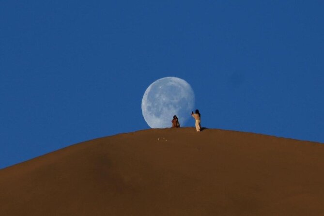 Qatar Desert Safari, Dune Bashing (Private Safari Tour) - Listening for the singing sand dunes