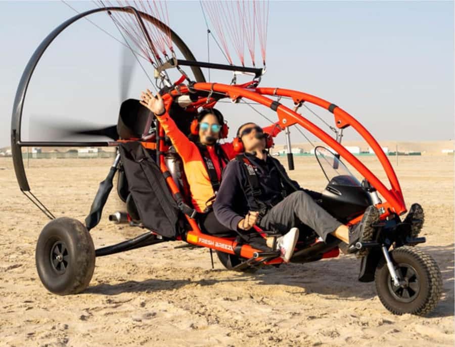 Qatar's Skybound Adventure: Exclusive Private Paratrike tour - Strapping into the paratrike