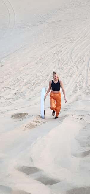 Sunrise or Sunset desert Safari with Sandboarding in Qatar - Leaving your accommodation for the open desert