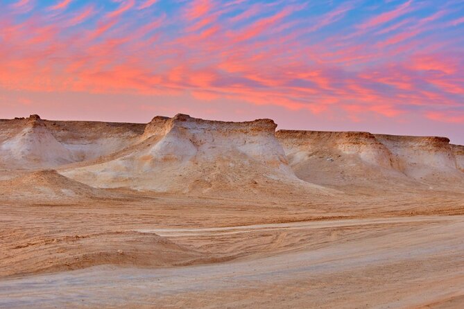 Sunset Keshta at Zekreet | Art, Adventure & Arabian Picnic - Richard Serra’s steel plates in the open desert