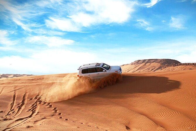 Thrilling 4-Hour Dune Bashing & Camel Ride Safari to Inland Sea - From Doha streets to open desert in 45 minutes