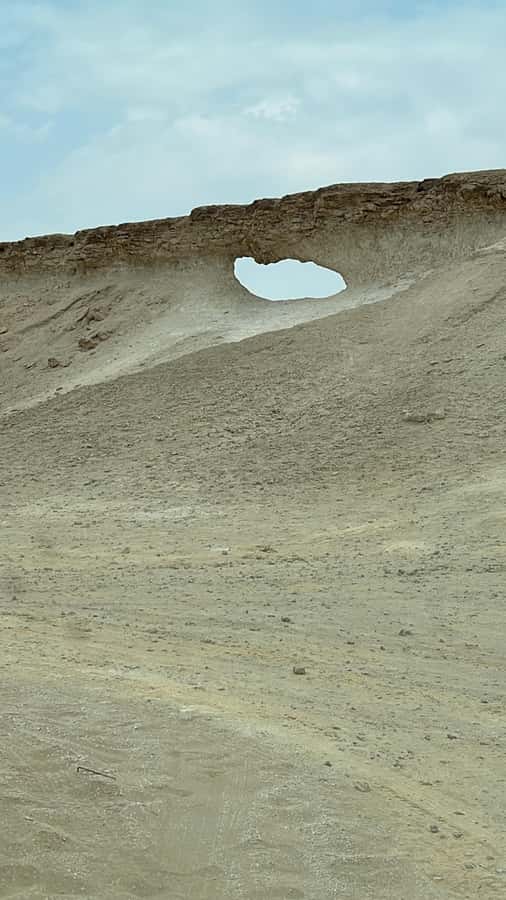 West Qatar tour to Richard Sierra sculpture,Umbrella Rock - The steel plates need time and silence